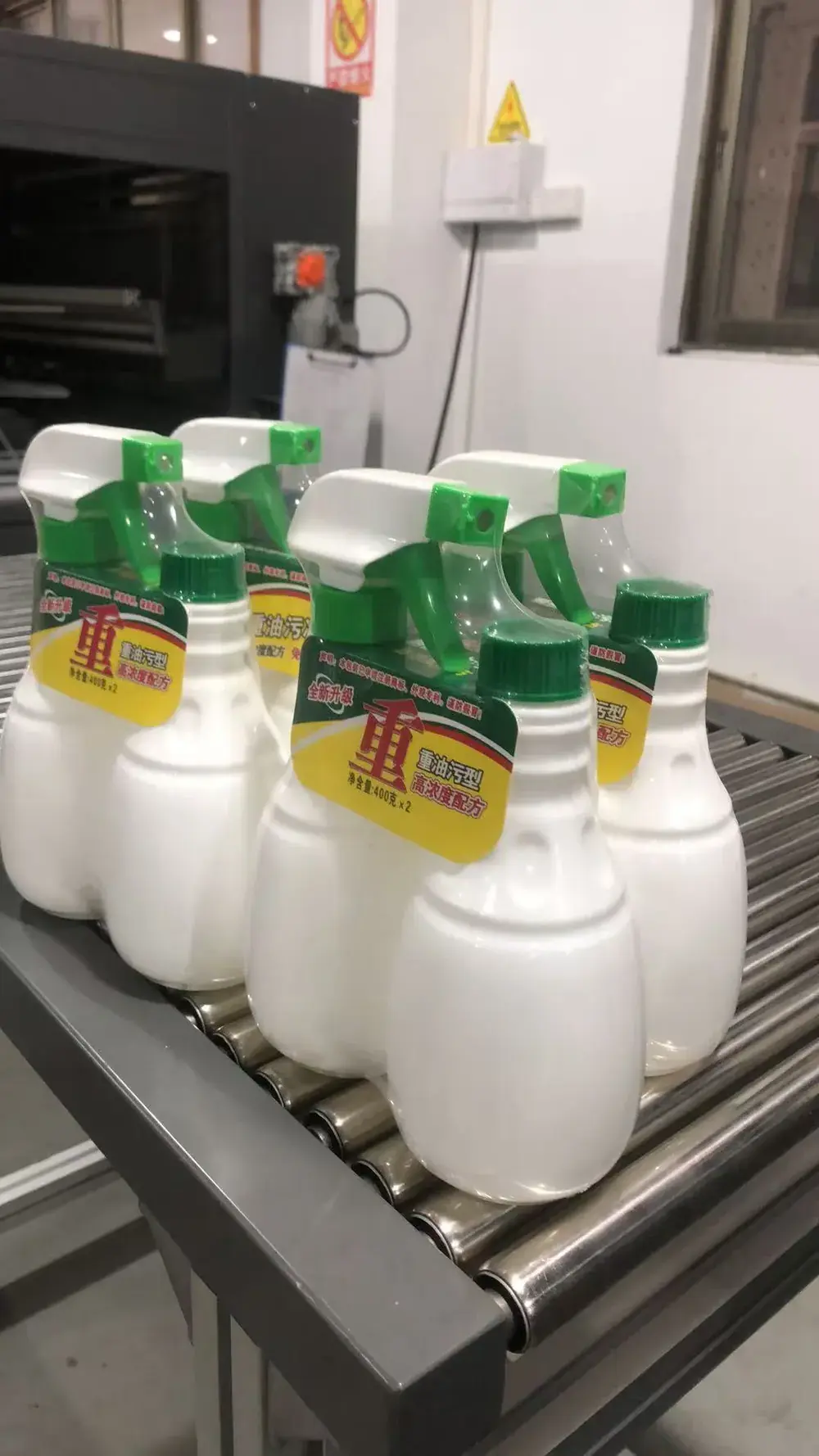 Spray bottles with shrink film